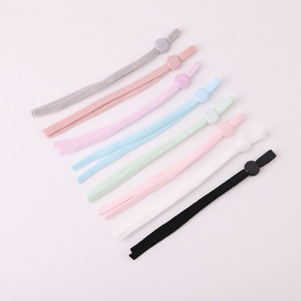 2 cintas rojas de cord&oacute;n el&aacute;stico con hebilla ajustable para sujetar la mascarilla.