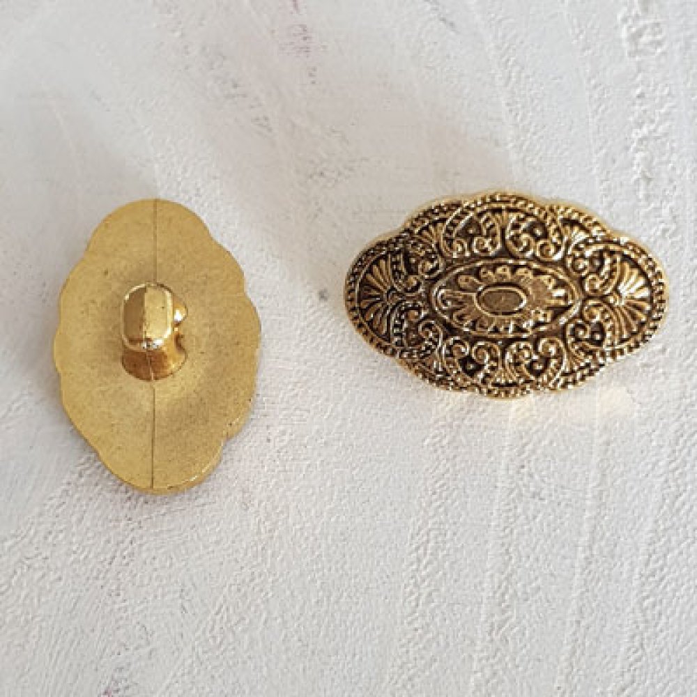 Botón de oro ovalado de 18 mm N°13