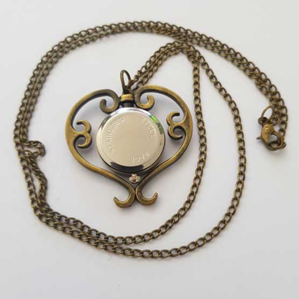 Reloj de fuelle corazón de bronce antiguo con cadena