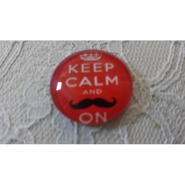 cabuj&oacute;n de vidrio redondo 25mm bigote 043 