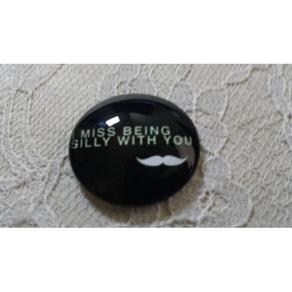 cabuj&oacute;n de vidrio redondo 25mm bigote 029 