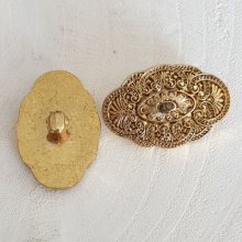 Botón ovalado dorado de 30 mm N°13