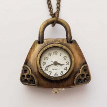 Reloj de bolso de fuelle de bronce antiguo con cadena