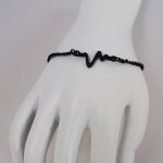 Pulsera fina negra diseño Waves