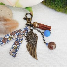 Llavero o joya para bolso con colgante ala de ángel color bronce marrón y azul 