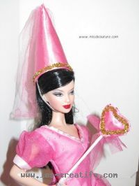 Muñeca Barbie sombrero de hada y varita mágica