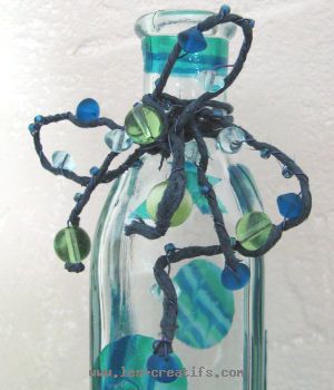 botella de baño con decoración de perlas