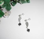 Pendientes de cuentas de cristal negro con ala en plata 925