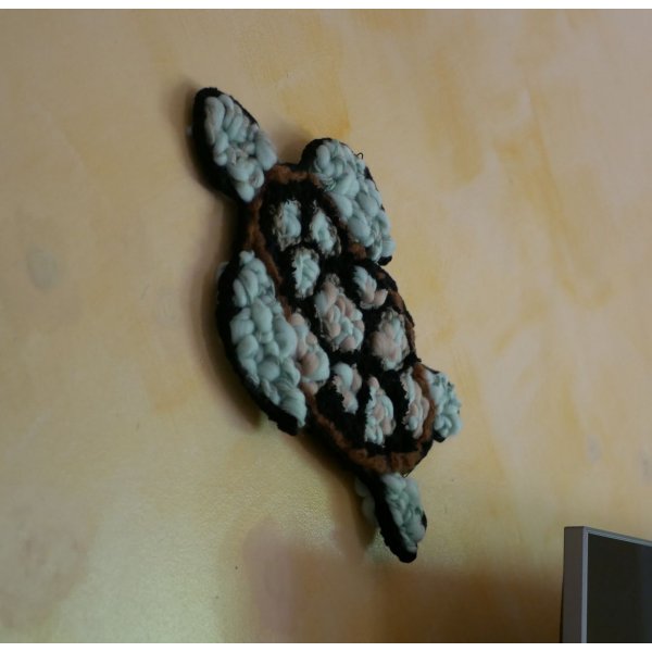 D&eacute;coration Tortue marine en tissage de laine noir et vert