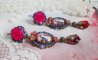 BO María y Jesús creados con cabujones de resina, peras rojas facetadas y diversos accesorios