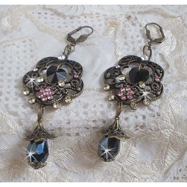 Colecci&oacute;n BO Irresistible Passion montada con cristales de Swarovski en portavelas florales de filigrana de bronce