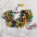 Bracelet Cézanne créé avec des grandes et petites fleurs peintes à la main dans les tons de Jaune, Or, Vert, Bleu, Cuivre, Marron et Bronze à laquelle s’ajoute perles : Aventurine et Jade Jaune Clair