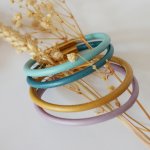 Pulsera redonda de cuero para mujer con cierre de bayoneta dorado
