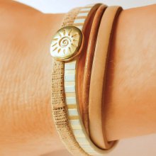 Pulsera brazalete de cuero de eslabones múltiples con lazo de sol dorado