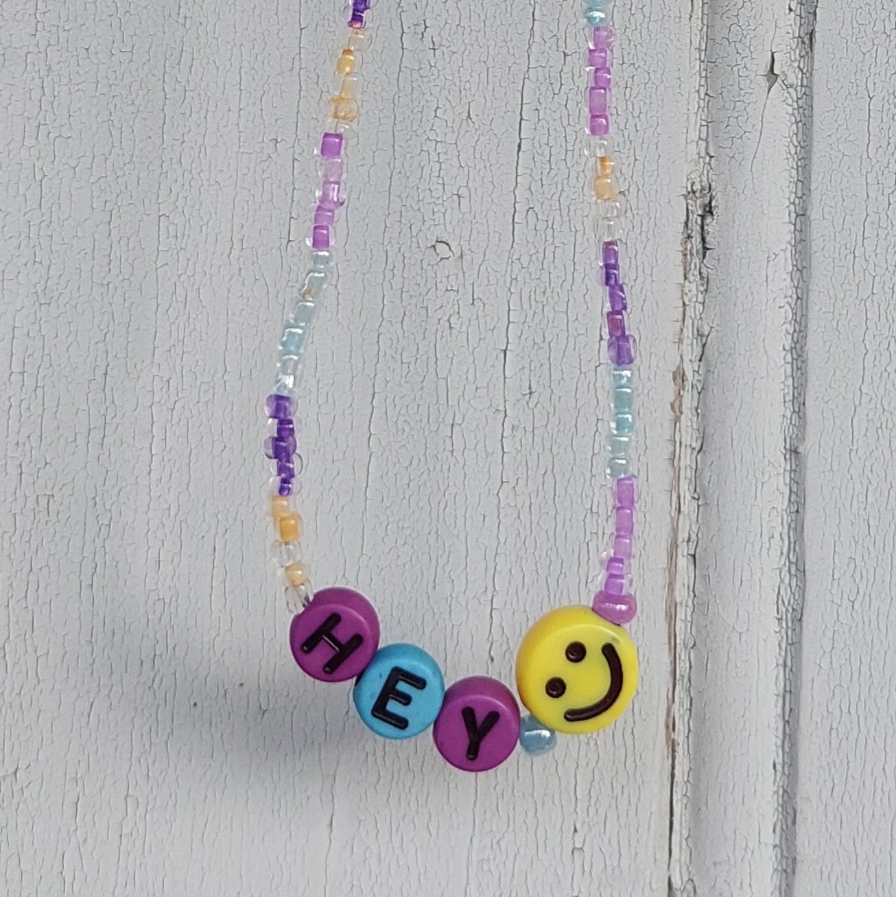 Ras du cou Smiley &agrave; rayures "HEY"