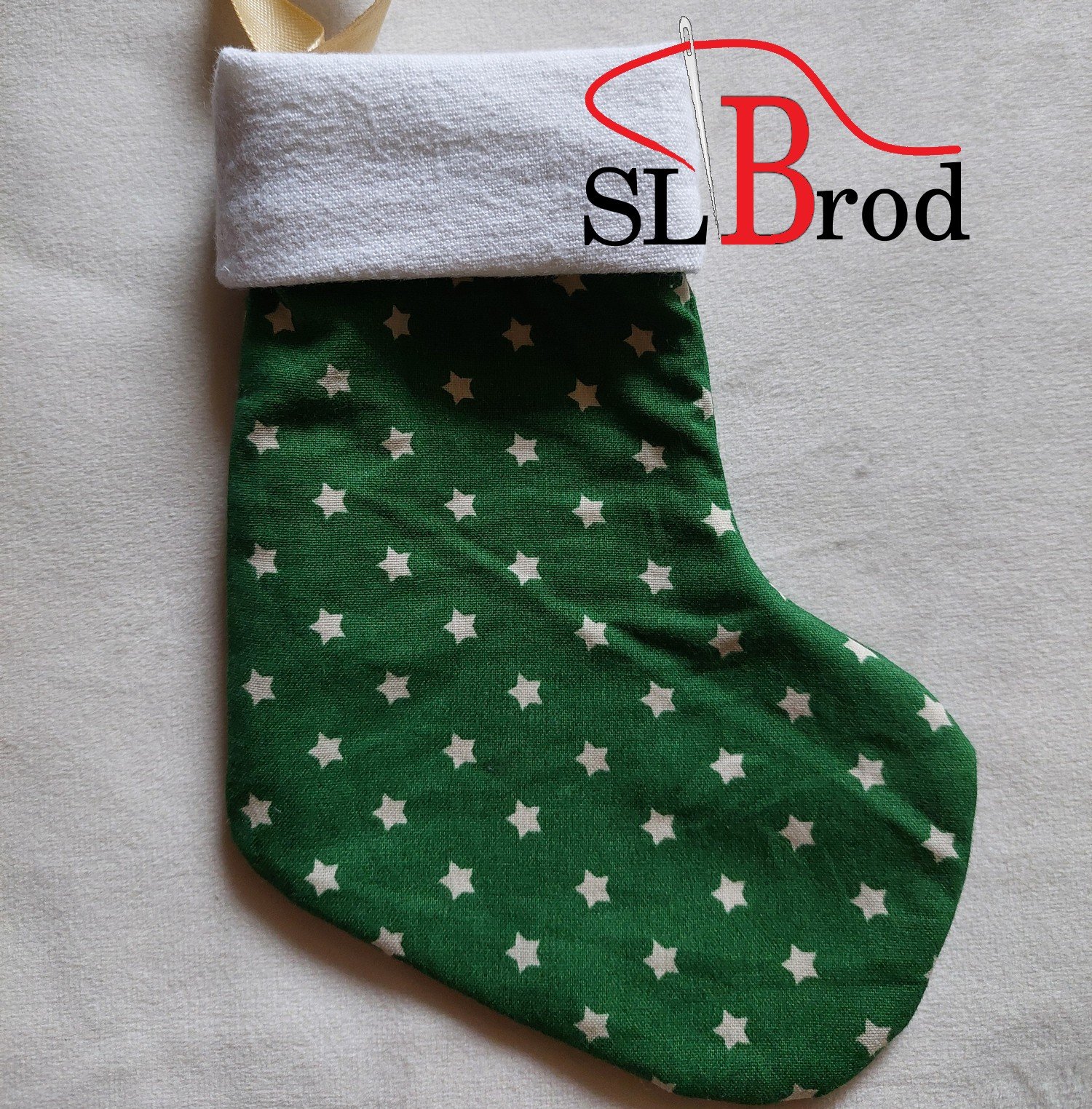 Petite chaussette de Noël Verte avec des étoiles