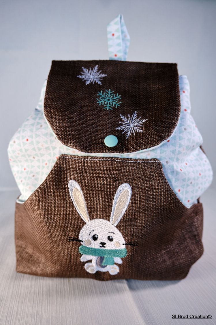 Mochila infantil conejo bufanda verde personalizable