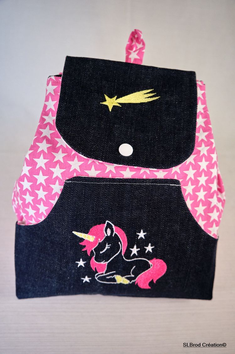 Mochila infantil bordada con unicornio y estrella fugaz