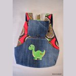 Mochila infantil bordada con dinosaurio y cera para personalizar con tu nombre